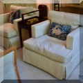 F08. Pair of cream colored club chairs. 27”h x29”w x 36”d 